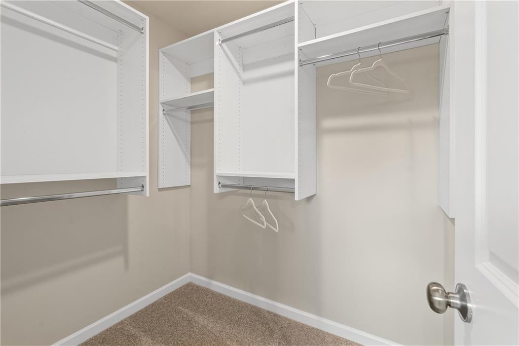 112 Bridgeview (lot 4) Way Canton, GA 30114 - Photo 32 of 45 a view of walk in closet with empty racks