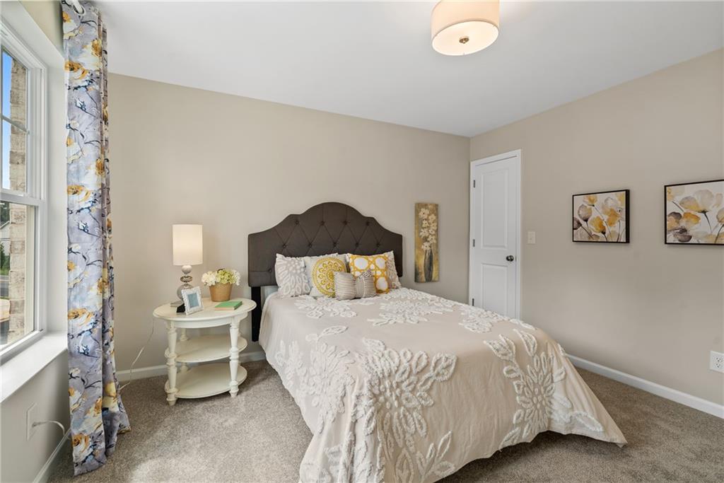 112 Bridgeview (lot 4) Way Canton, GA 30114 - Photo 37 of 45 a bedroom with a bed and a lamp