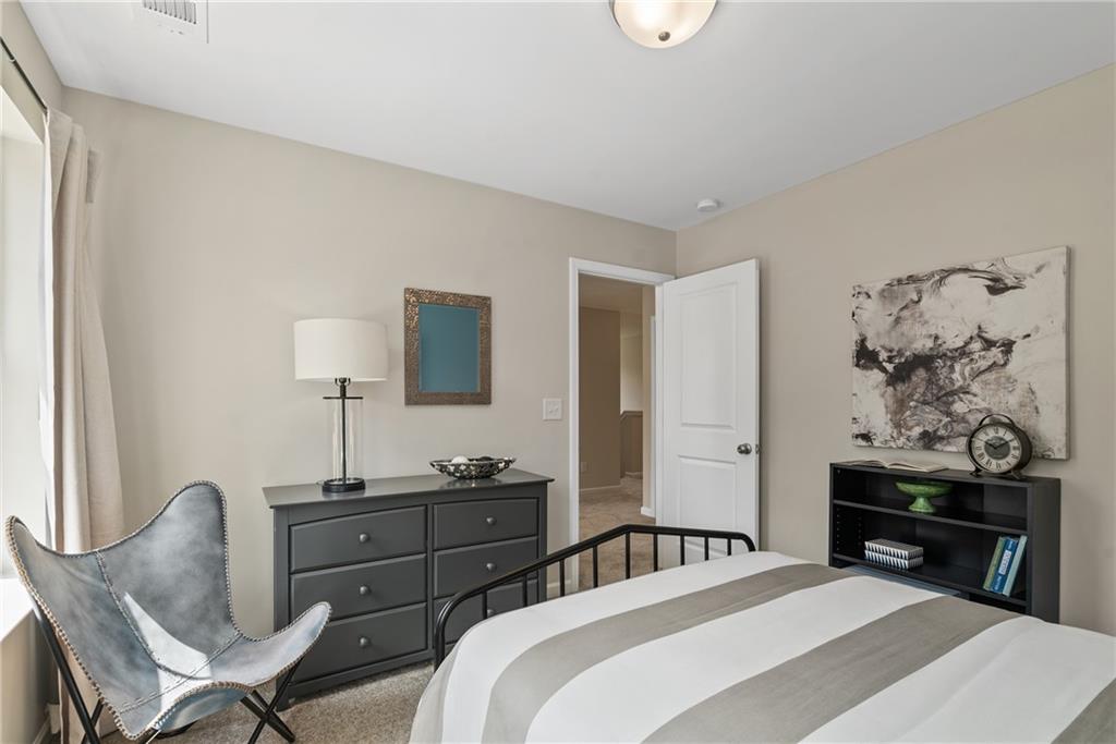 112 Bridgeview (lot 4) Way Canton, GA 30114 - Photo 39 of 45 a bedroom with a bed and a lamp on table