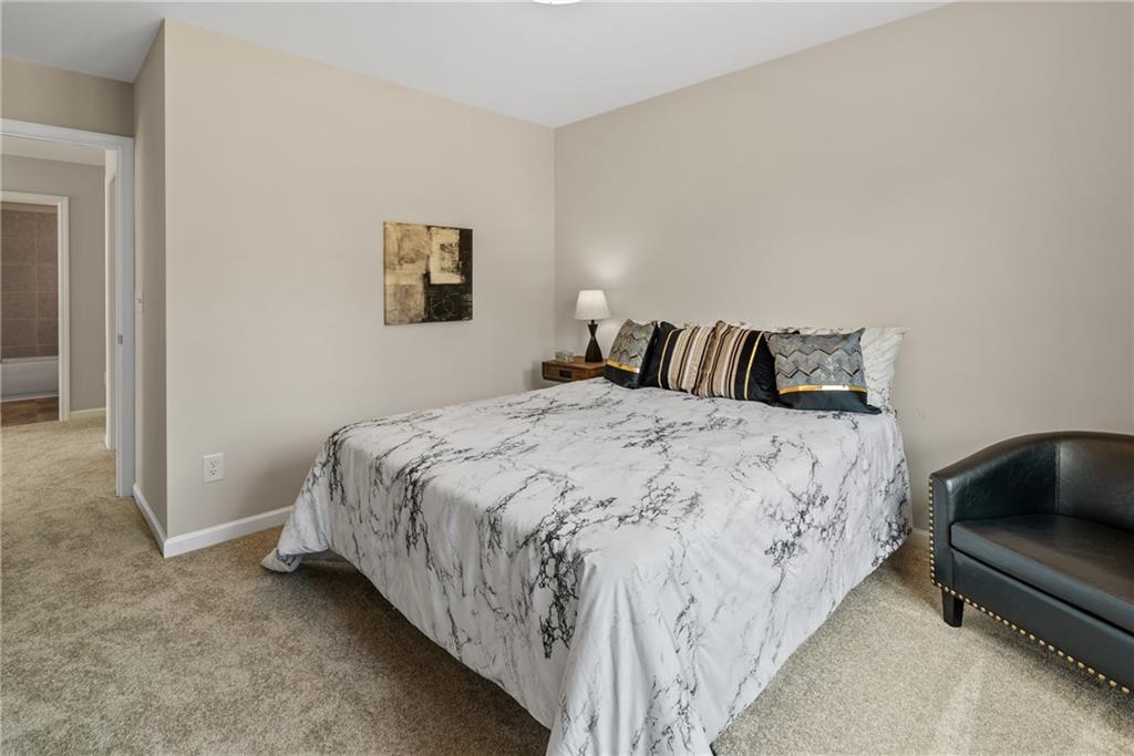 112 Bridgeview (lot 4) Way Canton, GA 30114 - Photo 41 of 45 a bedroom with a bed and a couch