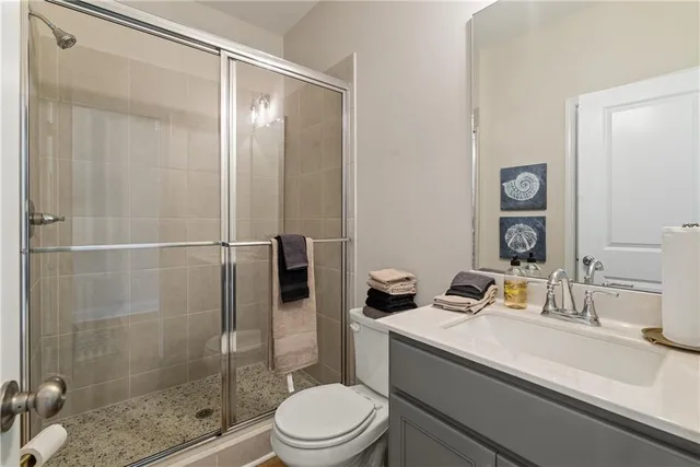 a living room with furniture fireplace and flat screen tv