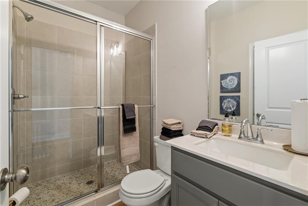 112 Bridgeview (lot 4) Way Canton, GA 30114 - Photo 9 of 45 a bathroom with a sink a toilet and shower