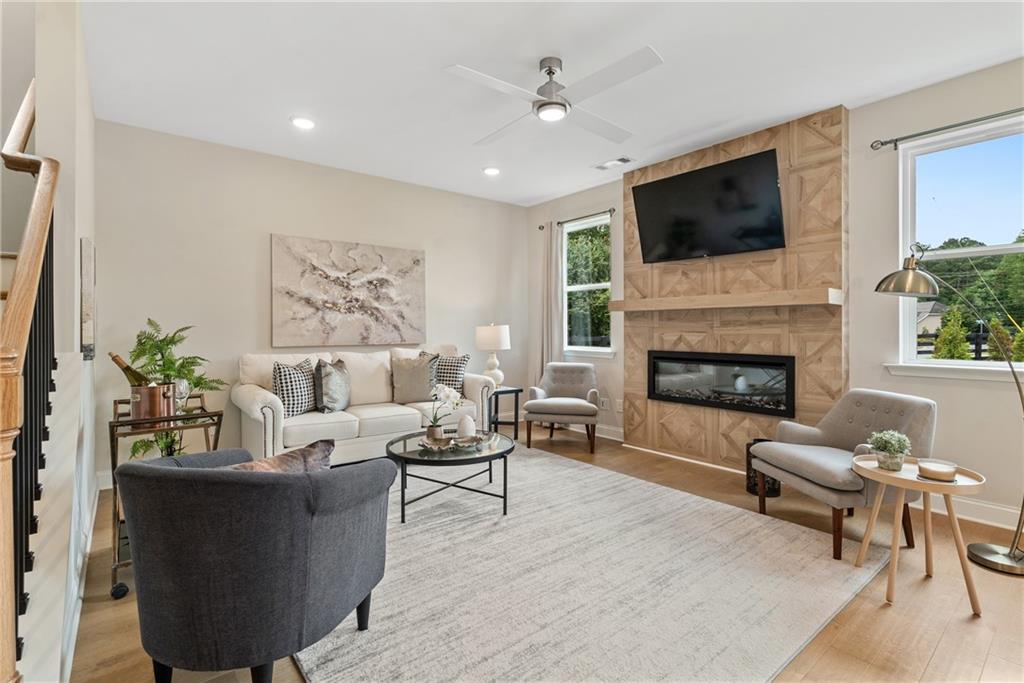 112 Bridgeview (lot 4) Way Canton, GA 30114 - Photo 10 of 45 a living room with furniture fireplace and flat screen tv