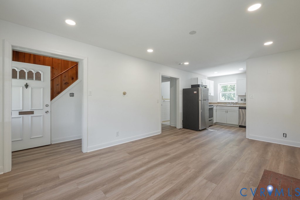 3400 Ryburn Road Richmond, VA 23234 - Photo 10 of 45 Open-concept living space featuring wood-finish fl