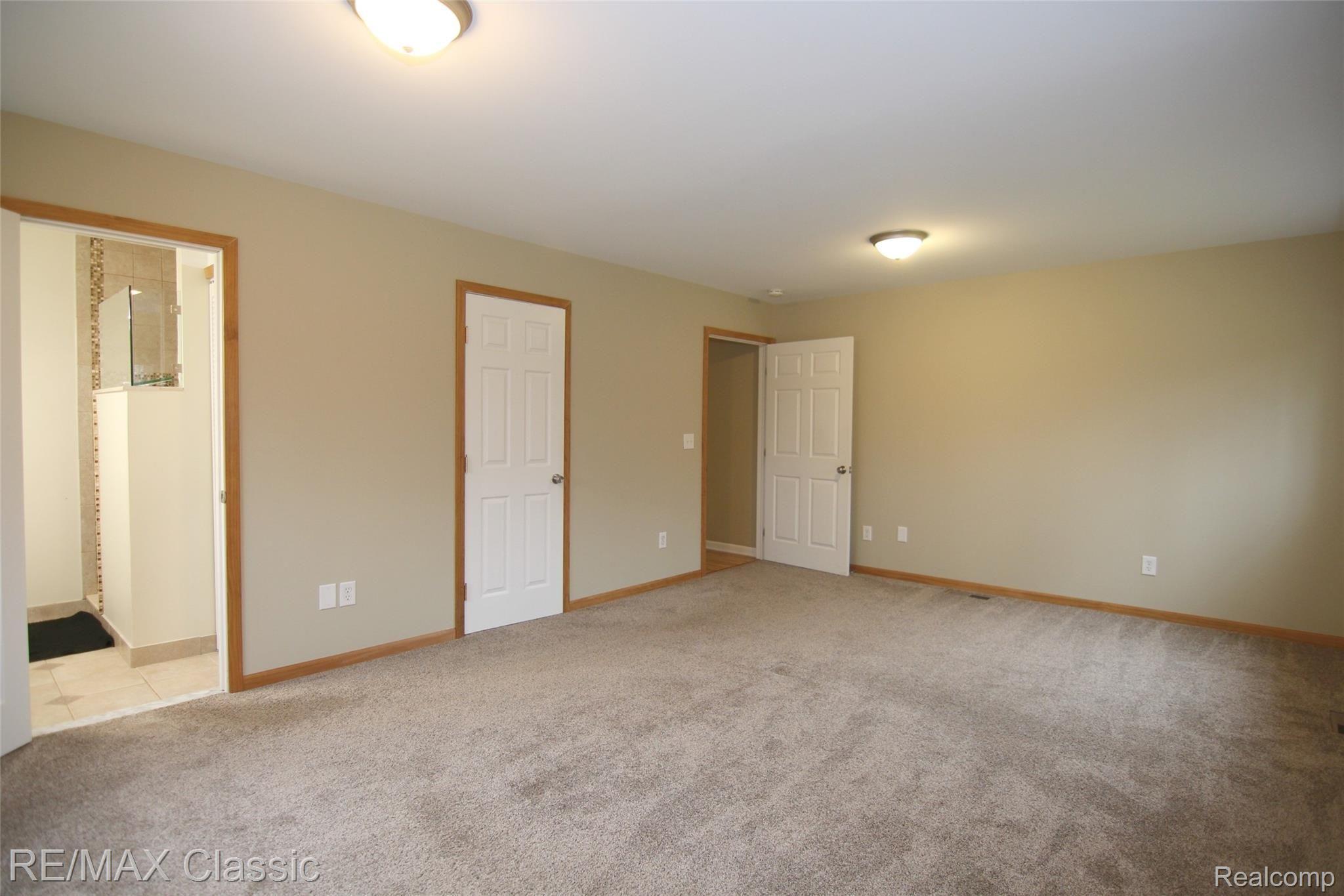 1605 Rowe Road Milford, MI 48380 - Photo 30 of 32 Rowe Rd Master Bedroom 2.jpg