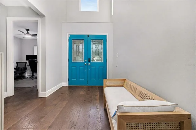 a living room with a furniture and a rug