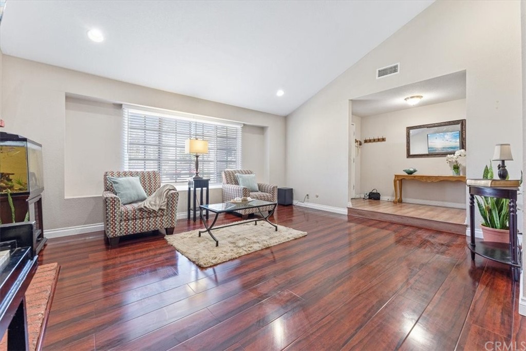 1013 London Circle Placentia, CA 92870 - Photo 12 of 45 a living room with furniture and a wooden floor