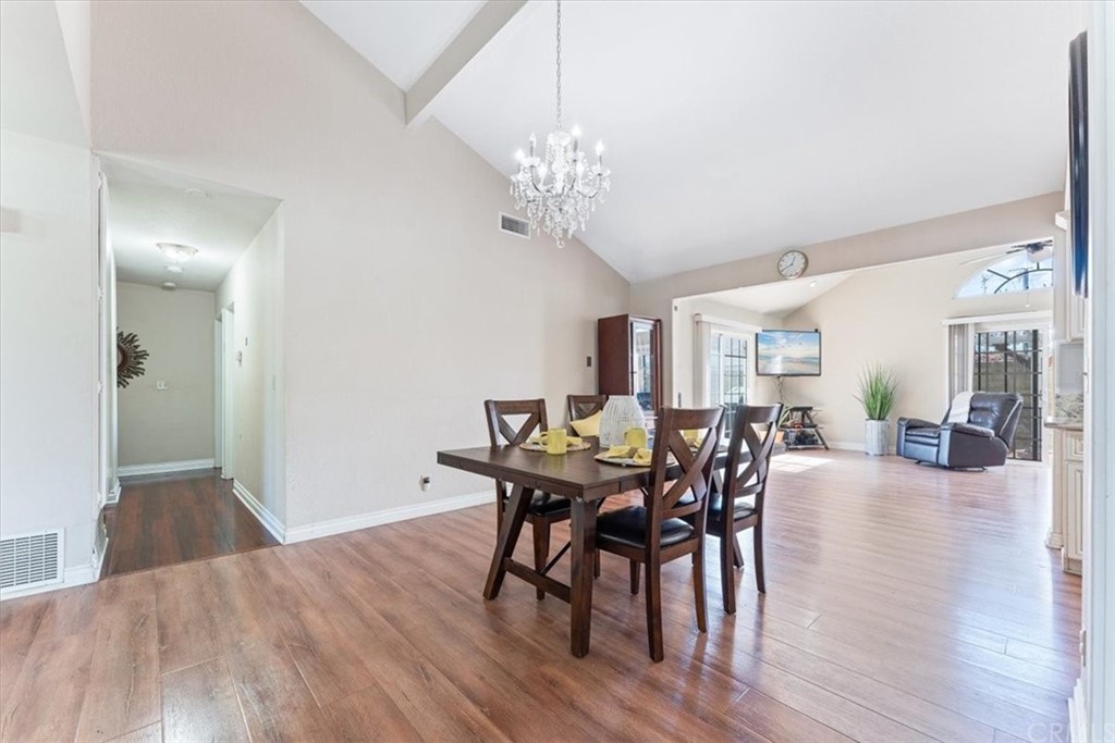 1013 London Circle Placentia, CA 92870 - Photo 16 of 45 a view of a dining room with furniture and wooden floor