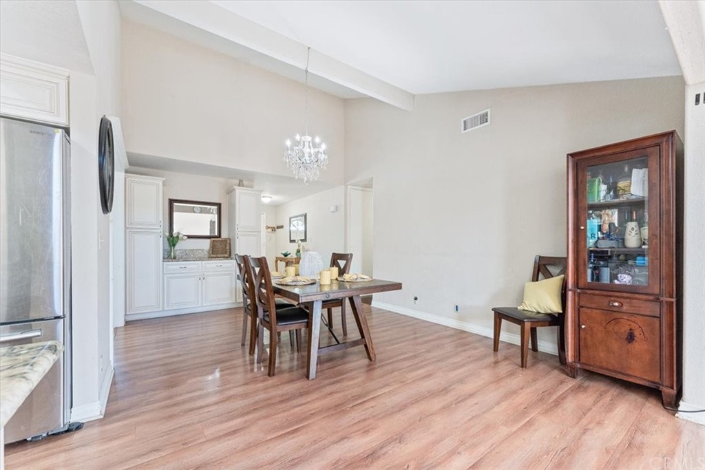 1013 London Circle Placentia, CA 92870 - Photo 17 of 45 a view of a dining room with furniture and wooden floor