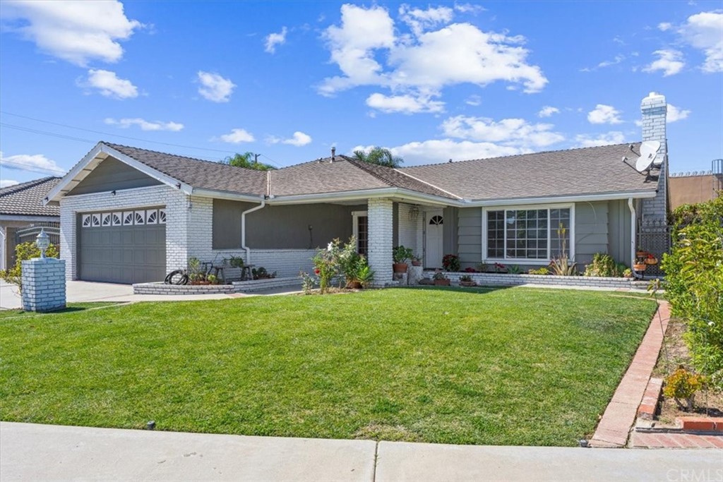 1013 London Circle Placentia, CA 92870 - Photo 4 of 45 a front view of a house with swimming pool having outdoor seating