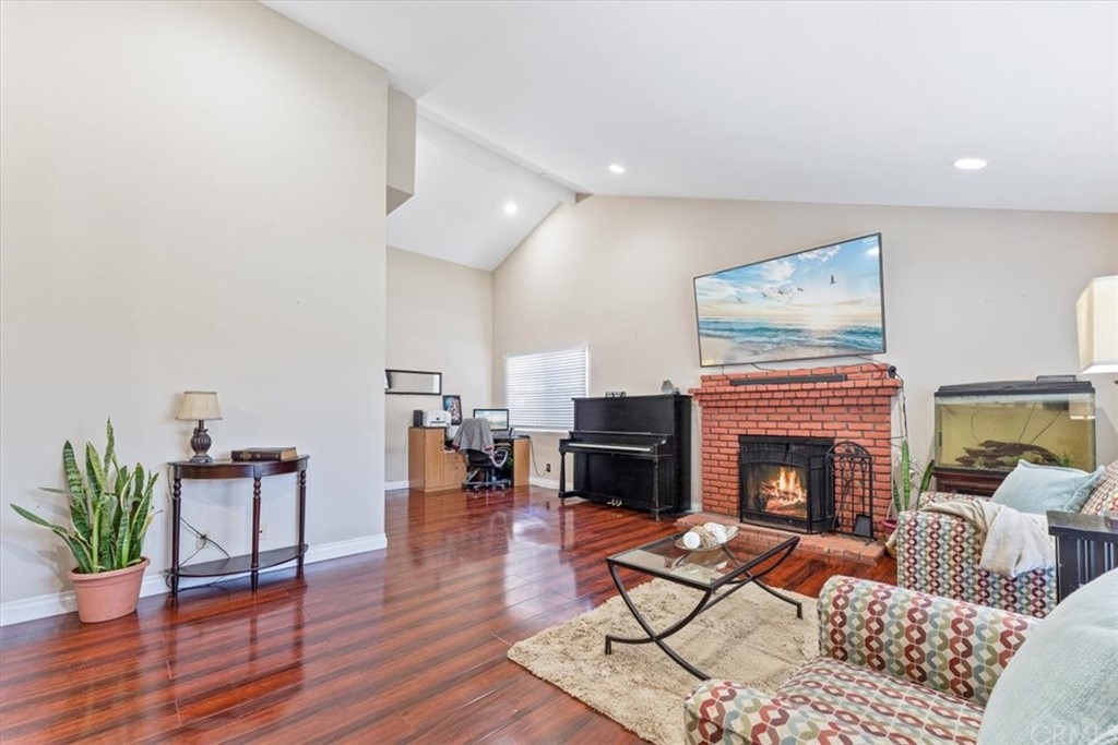 1013 London Circle Placentia, CA 92870 - Photo 9 of 45 a living room with furniture and a fireplace