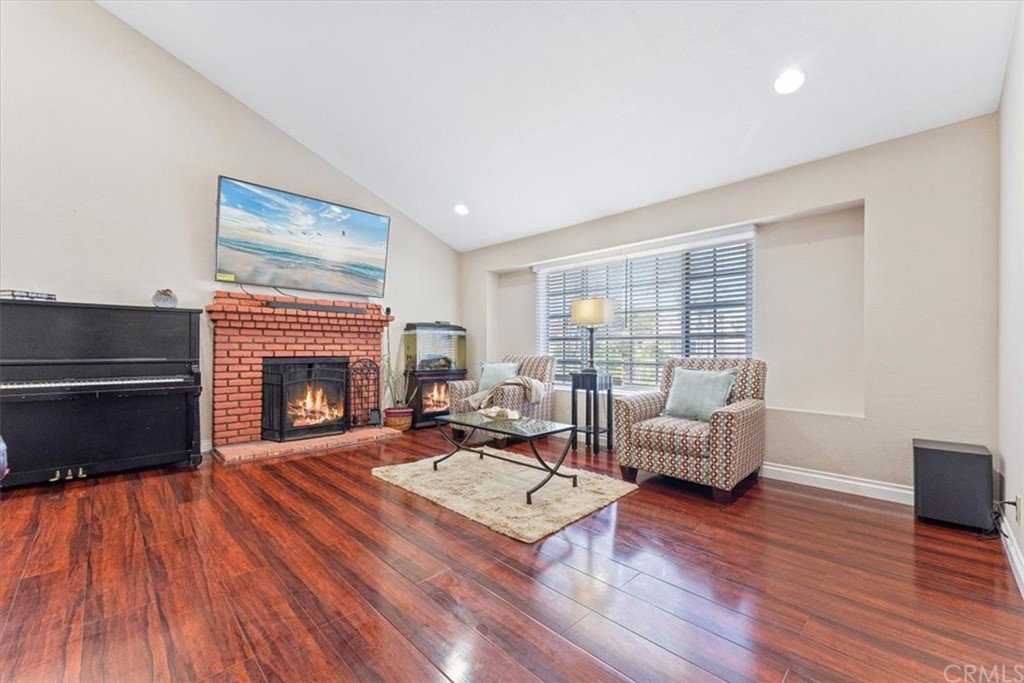 1013 London Circle Placentia, CA 92870 - Photo 10 of 45 a living room with furniture fireplace and flat screen tv