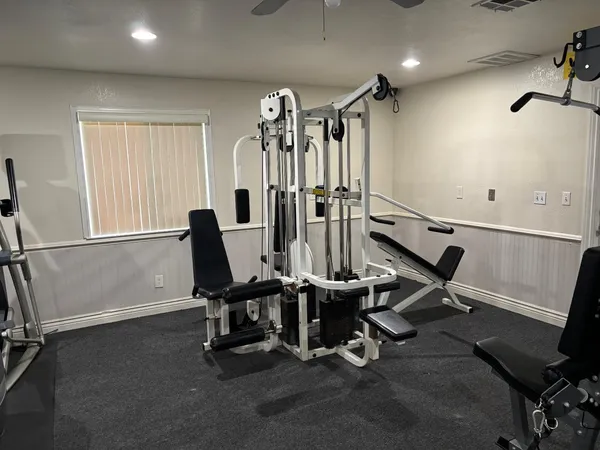 a view of a room with gym equipment