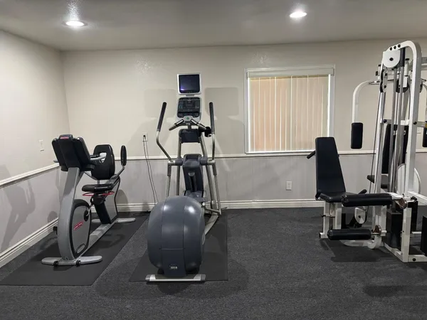 a view of a room with gym equipment