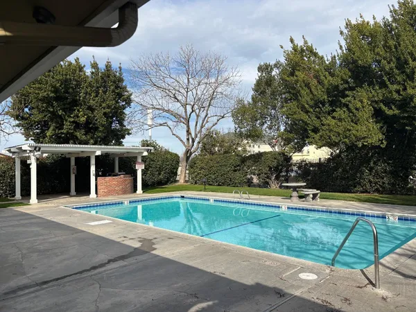 a view of a house with a swimming pool