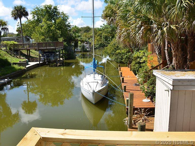 118 Charles Street Edgewater, FL 32141 - Photo 7 of 8 a view of boat floating on water