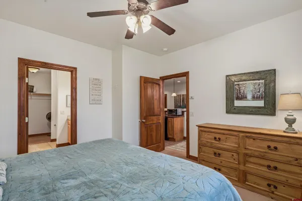 a bathroom with a shower and a sink