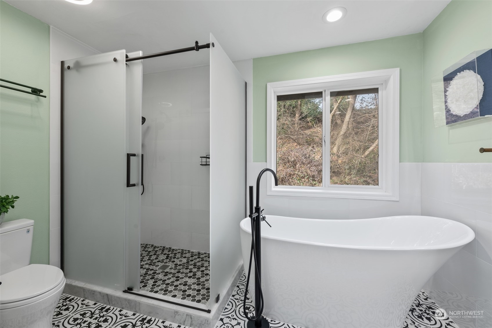 1701 226th Place Southwest Bothell, WA 98021 - Photo 18 of 30 a bathroom with a shower a toilet a window and a shower