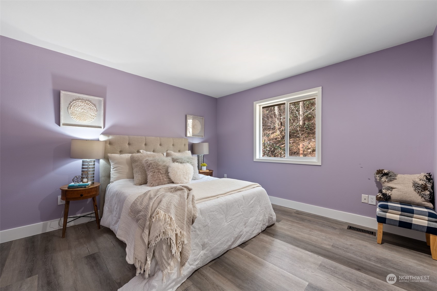 1701 226th Place Southwest Bothell, WA 98021 - Photo 21 of 30 a bedroom with a bed and a window