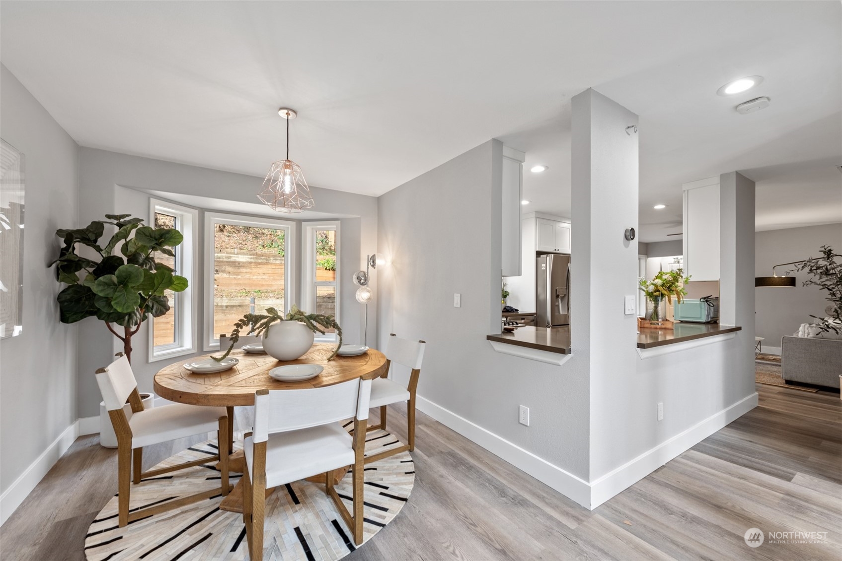 1701 226th Place Southwest Bothell, WA 98021 - Photo 6 of 30 a view of a dining room with furniture and window