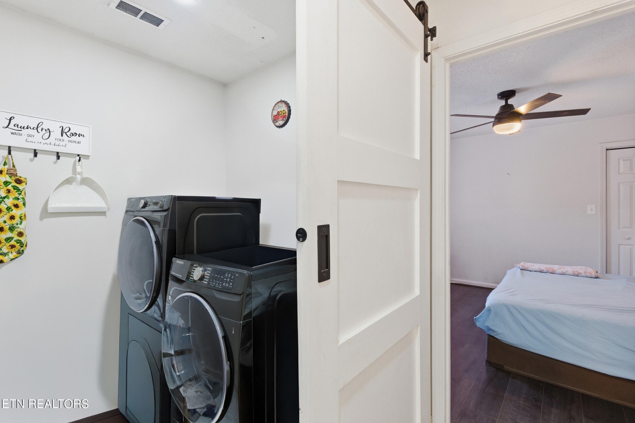7712 Ralph Youmans Road Corryton, TN 37721 - Photo 12 of 33 a utility room with dryer and washer