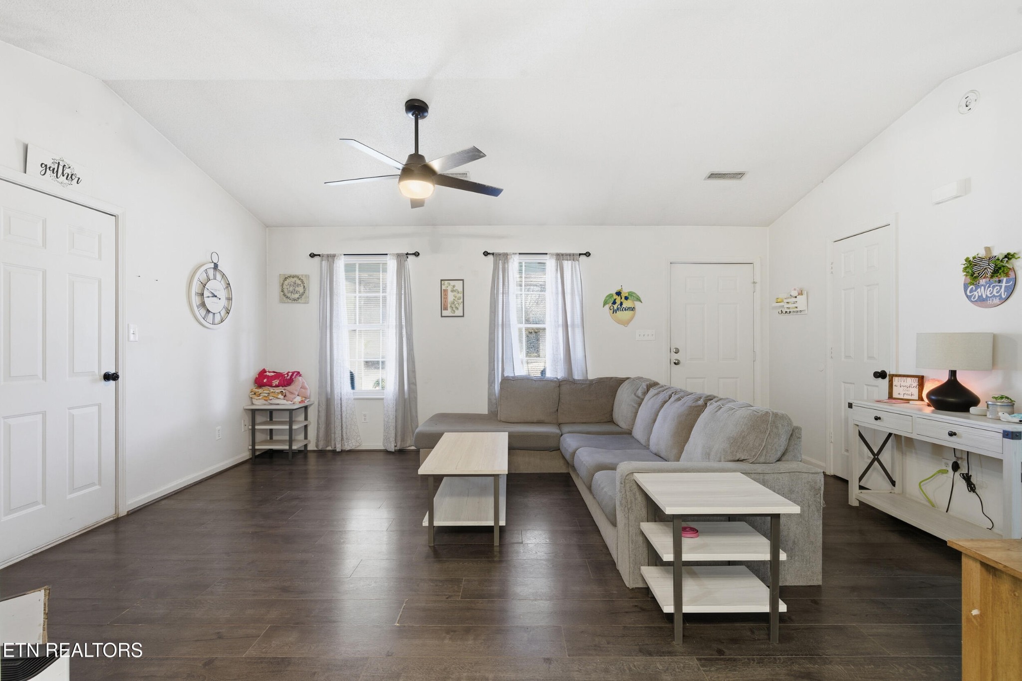 7712 Ralph Youmans Road Corryton, TN 37721 - Photo 21 of 33 a living room with furniture and wooden floor