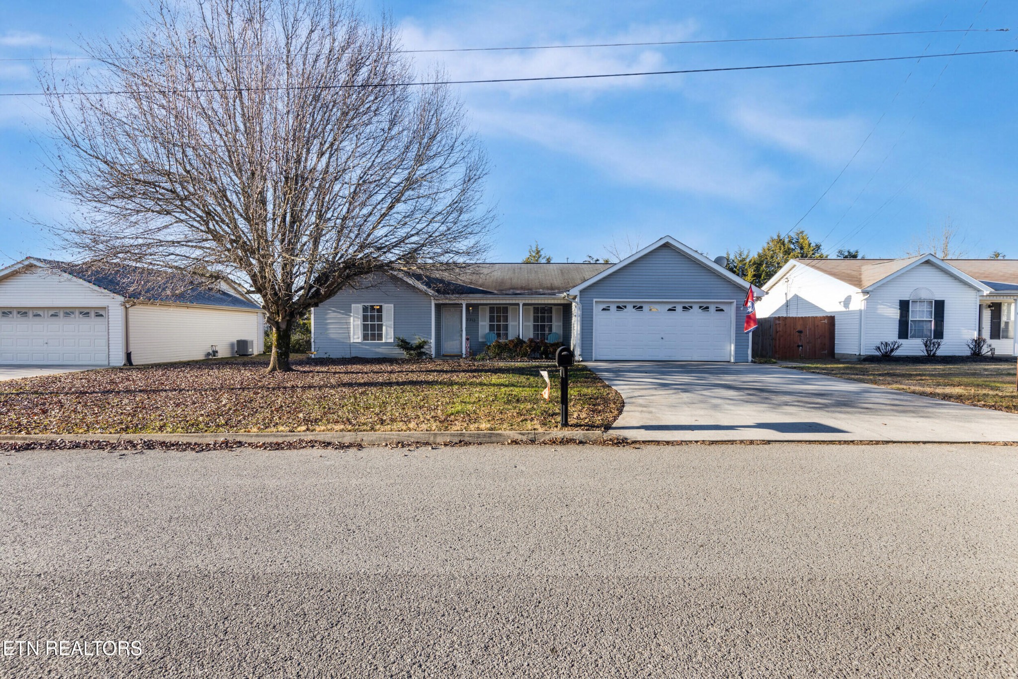 7712 Ralph Youmans Road Corryton, TN 37721 - Photo 33 of 33 a front view of a house with a yard