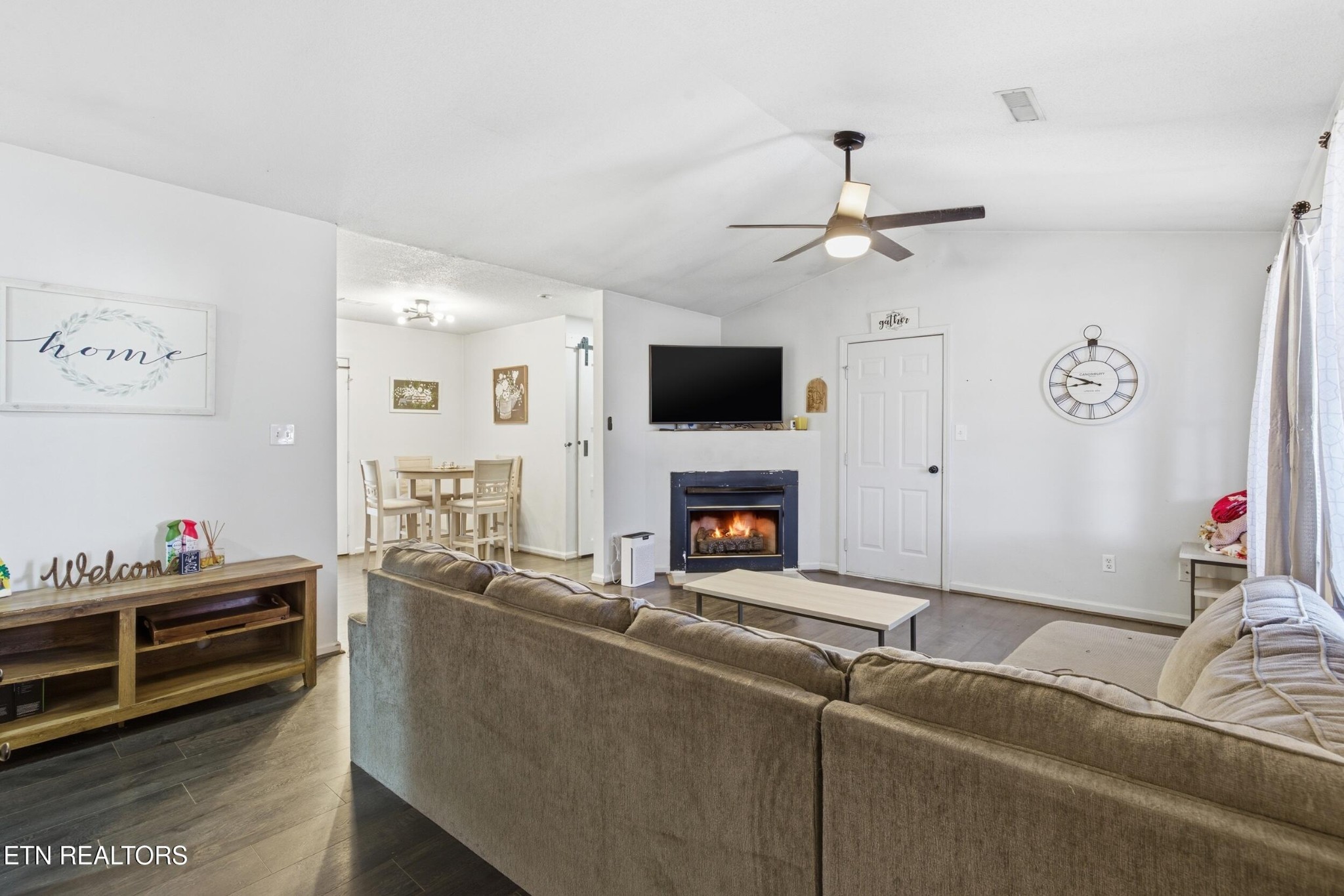 7712 Ralph Youmans Road Corryton, TN 37721 - Photo 5 of 33 a living room with furniture and a fireplace