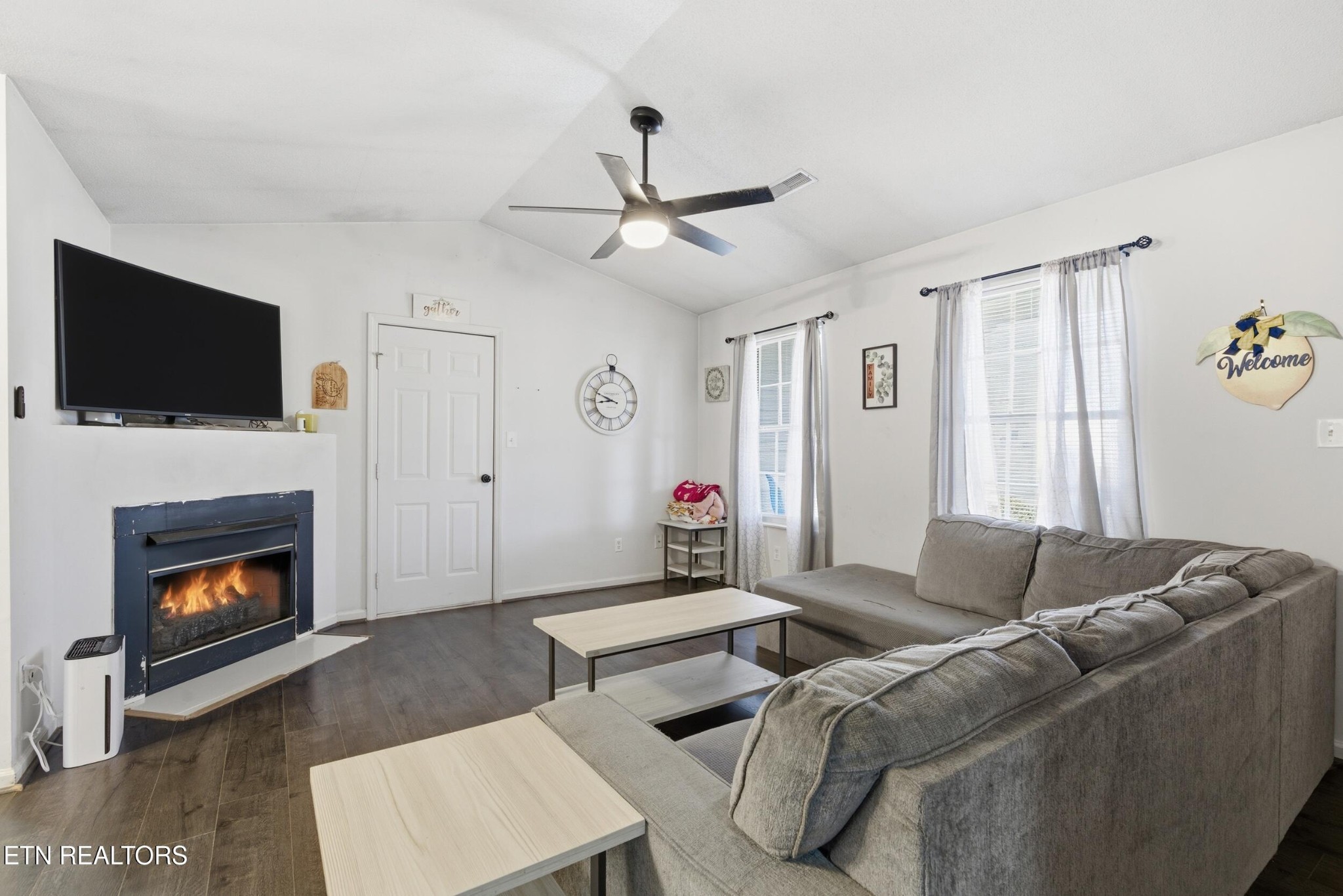 7712 Ralph Youmans Road Corryton, TN 37721 - Photo 6 of 33 a living room with furniture and a flat screen tv