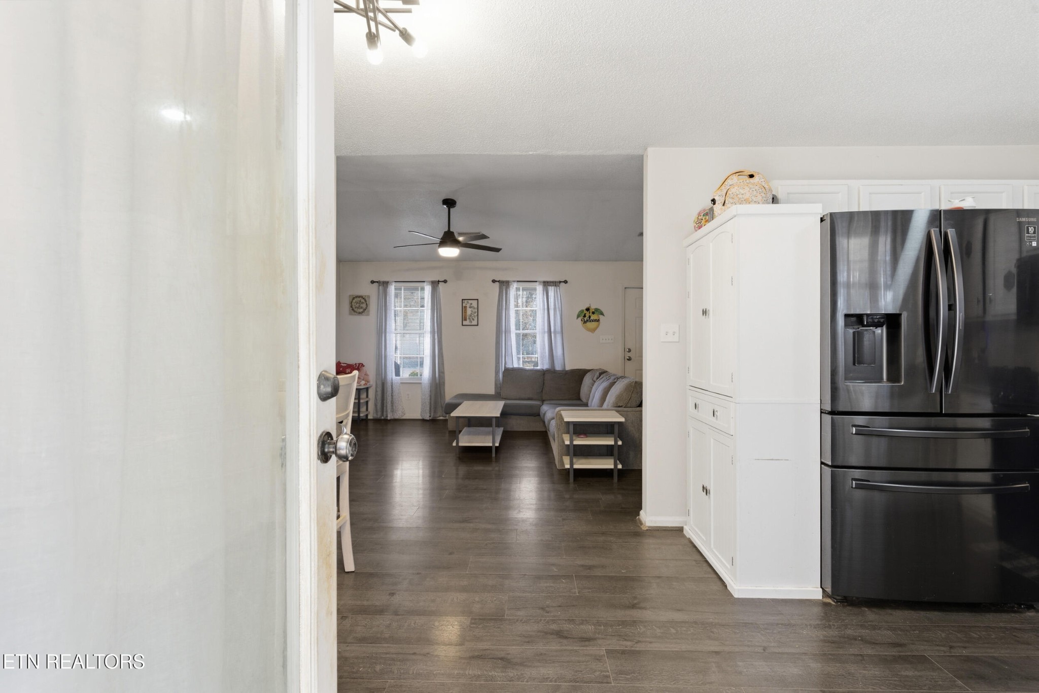 7712 Ralph Youmans Road Corryton, TN 37721 - Photo 10 of 33 a view of kitchen with furniture and refrigerator