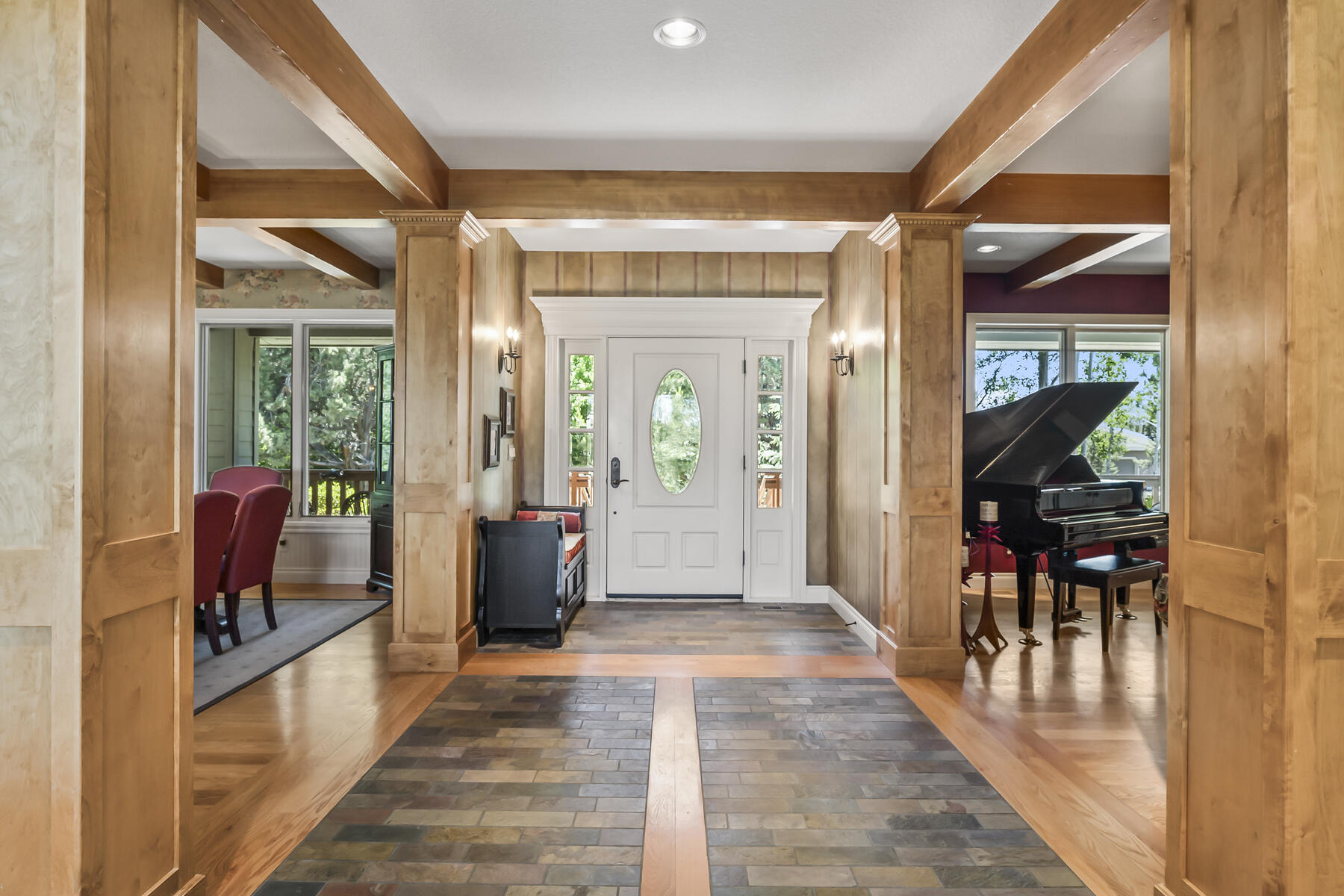 61445 Gosney Road Bend, OR 97702 - Photo 32 of 83 a view of a hallway with wooden floor and furniture