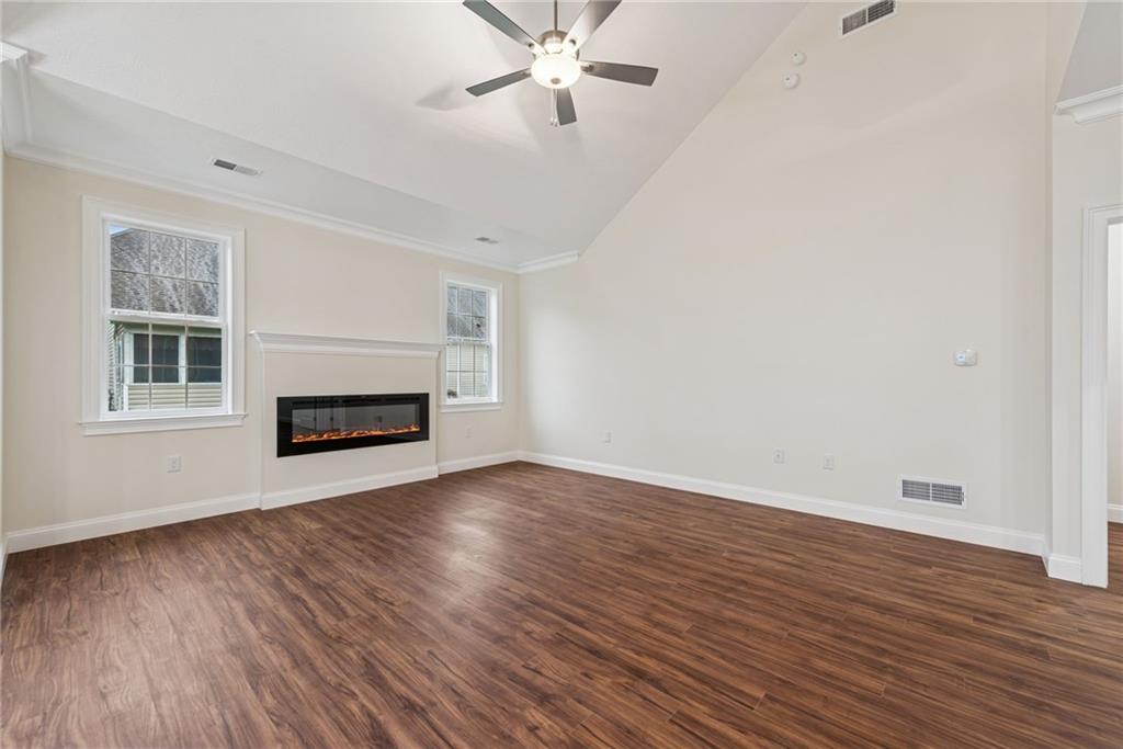 406 Kastner Street Ligonier, PA 15658 - Photo 19 of 35 a view of empty room with wooden floor and fan