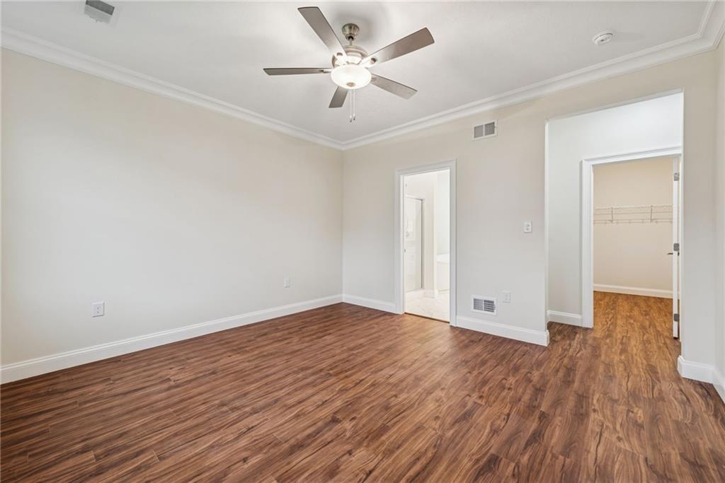 406 Kastner Street Ligonier, PA 15658 - Photo 23 of 35 an empty room with wooden floor and a ceiling fan