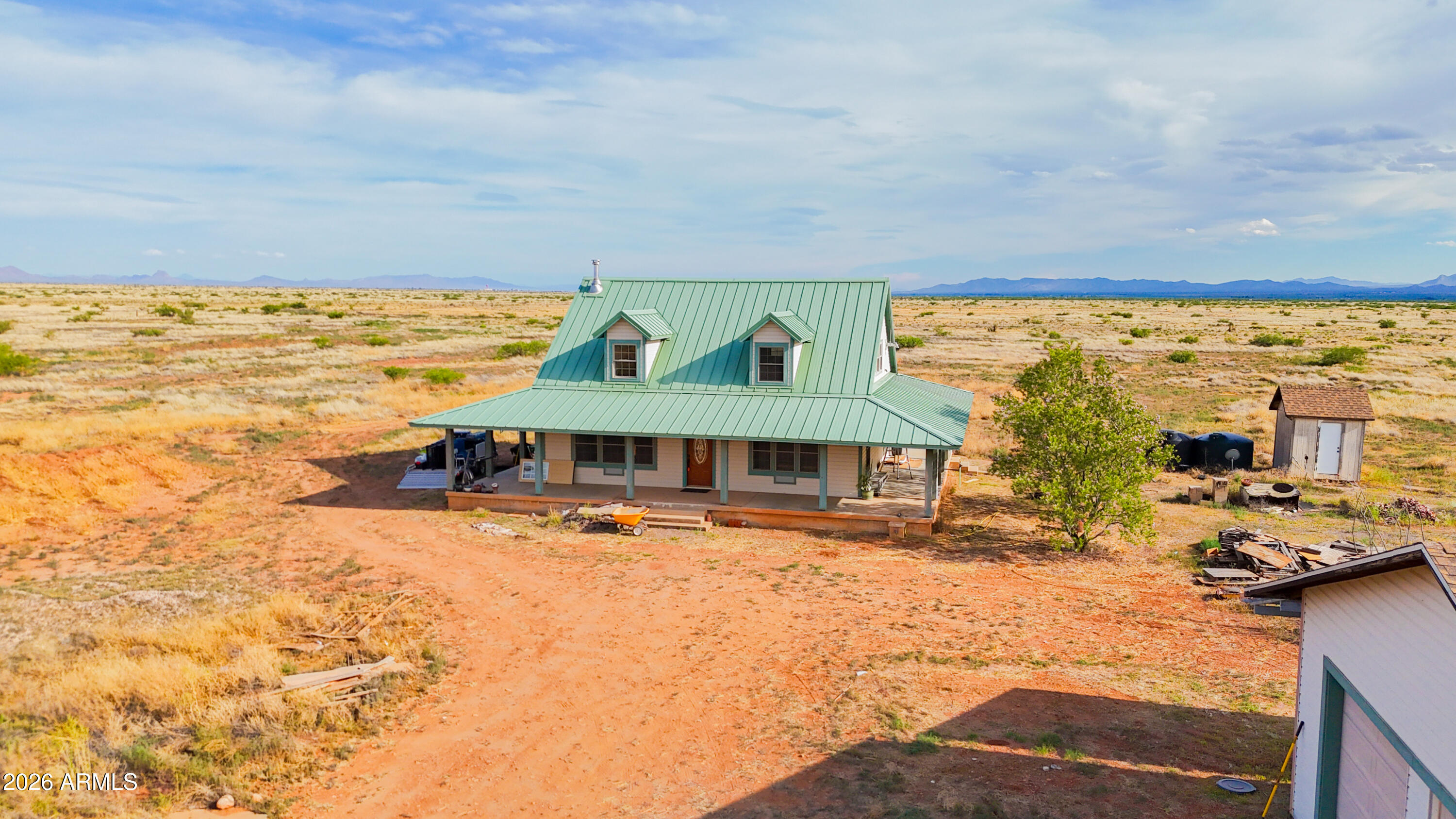 3429 West Markel Road Douglas, AZ 85607 - Photo 2 of 47 a view of a swimming pool with an ocean view