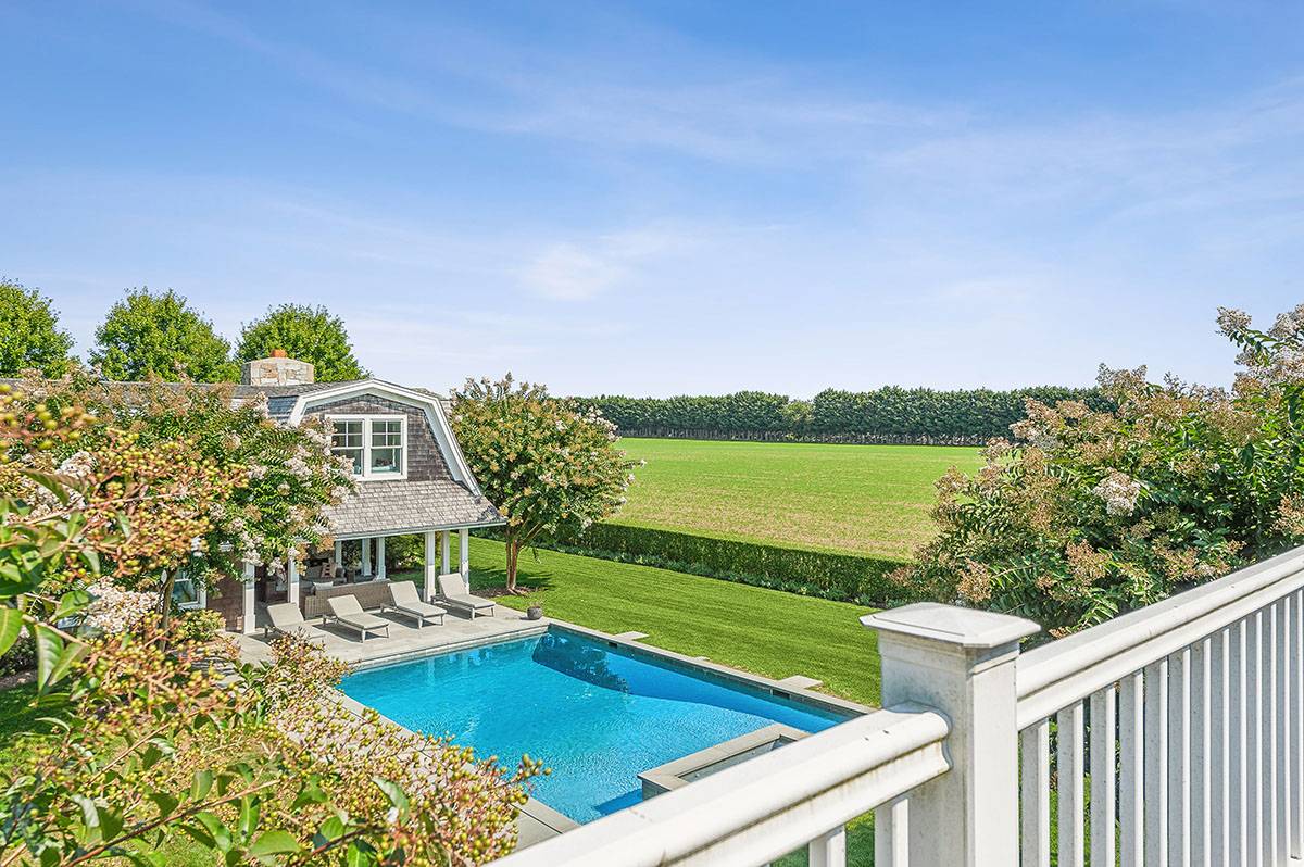 63 Newlight Lane Bridgehampton, NY 11976 - Photo 29 of 37 a view of a chairs and table on the terrace