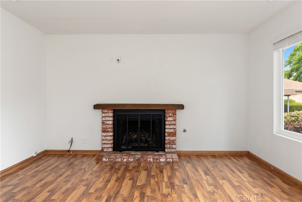 18 Flag Way Paso Robles, CA 93446 - Photo 4 of 22 a view of an empty room with wooden floor and a window