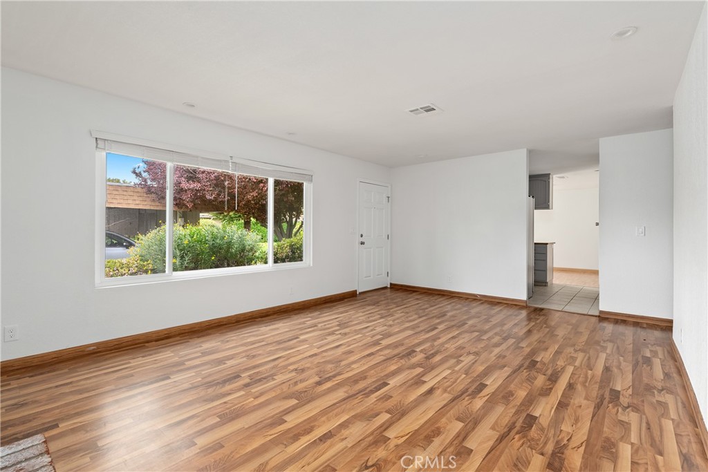 18 Flag Way Paso Robles, CA 93446 - Photo 5 of 22 a view of empty room with wooden floor and fan