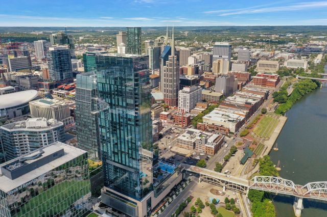 a room with furniture and wooden floor