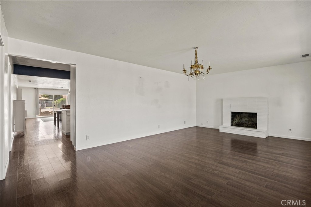 417 Jefferson Street Willows, CA 95988 - Photo 15 of 32 wooden floor in an empty room with a window