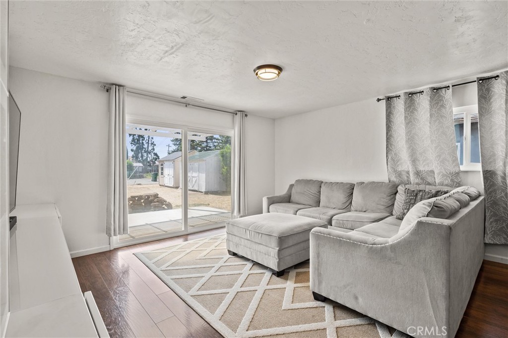 417 Jefferson Street Willows, CA 95988 - Photo 18 of 32 a living room with furniture and a large window