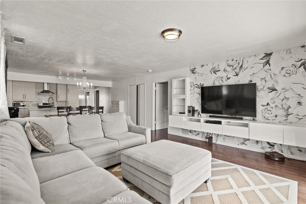 417 Jefferson Street Willows, CA 95988 - Photo 2 of 32 a living room with furniture and a flat screen tv