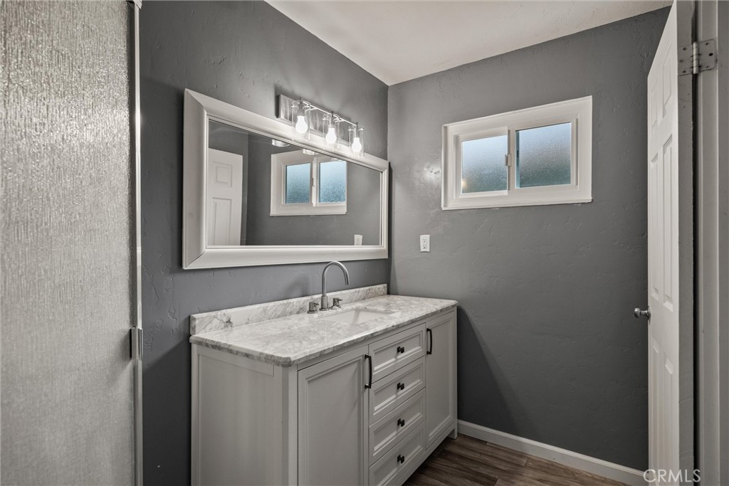 417 Jefferson Street Willows, CA 95988 - Photo 21 of 32 a bathroom with a sink and a mirror
