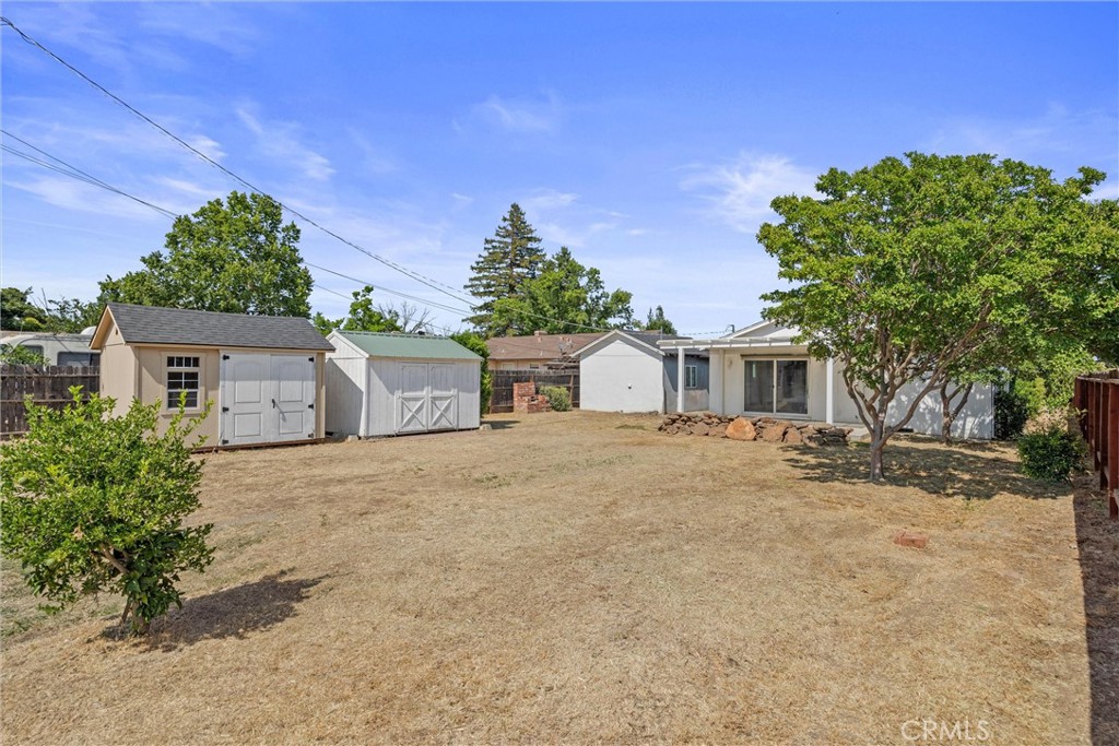 417 Jefferson Street Willows, CA 95988 - Photo 30 of 32 a front view of a house with a yard and garage