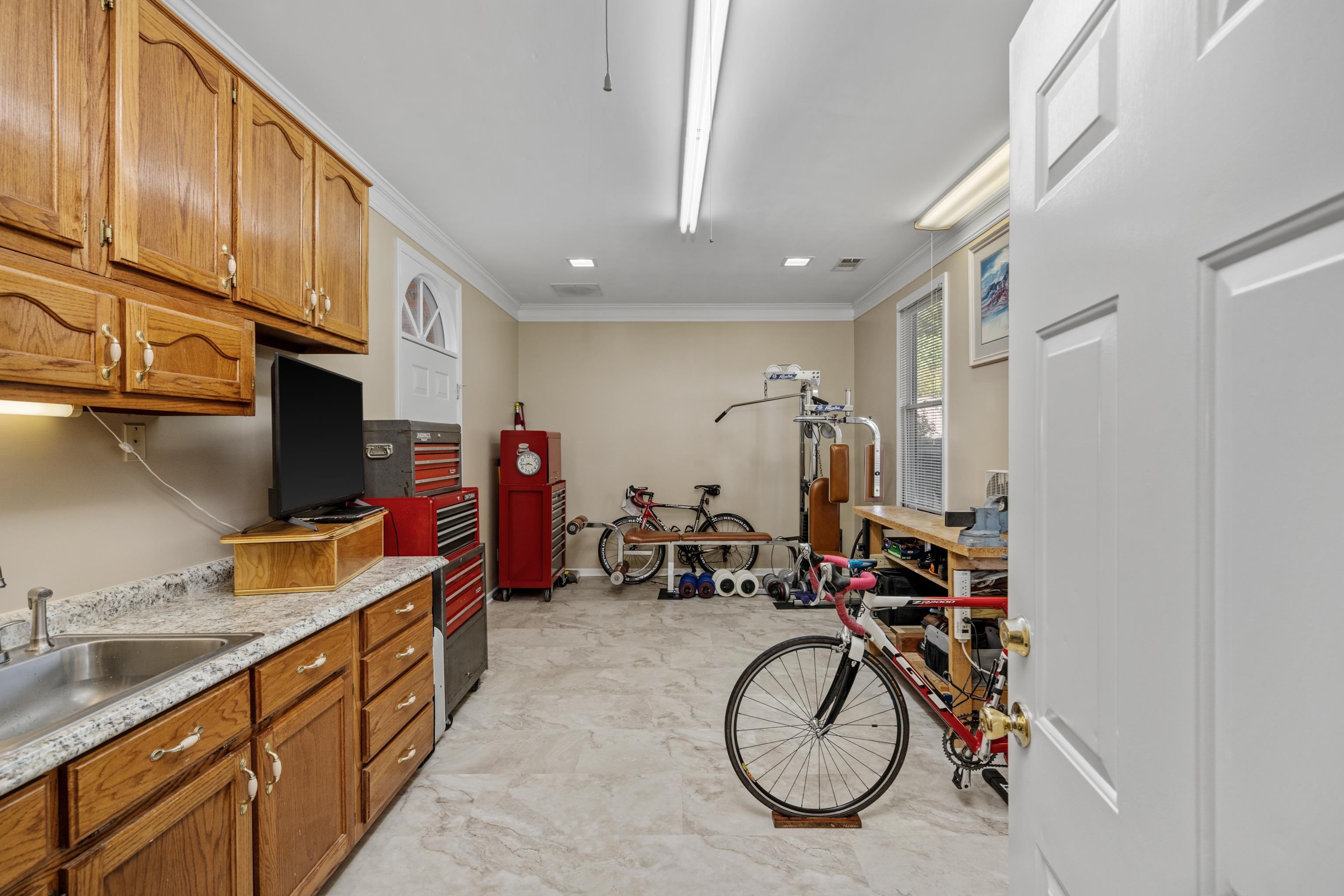 10265 Crooked Creek Road Collierville, TN 38017 - Photo 21 of 40 Flex Room perfect for workshop, home office, or exercise room. This room can be accessed from outside also.