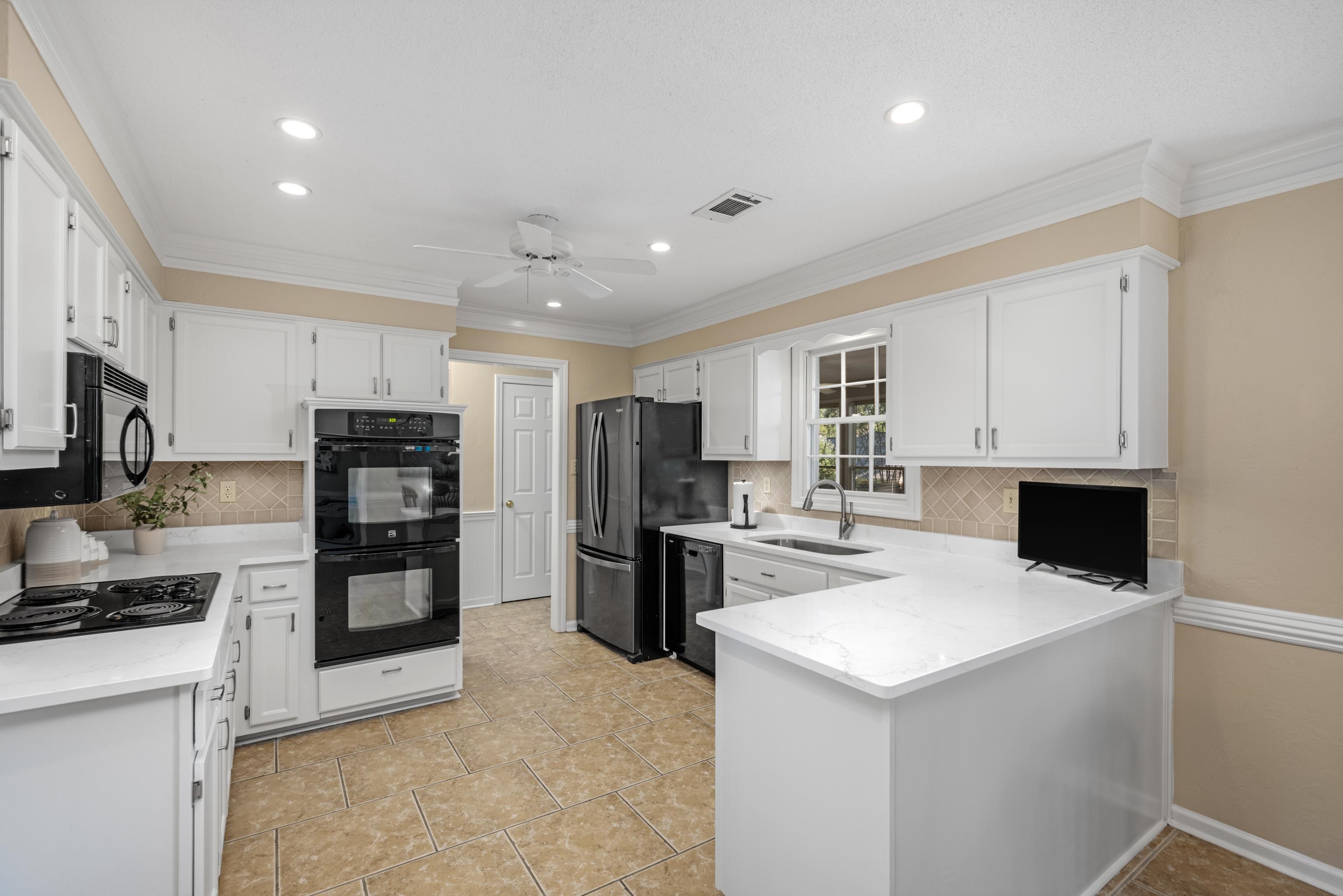 10265 Crooked Creek Road Collierville, TN 38017 - Photo 7 of 40 Updated with quartz counter tops, tile back splash, and double ovens