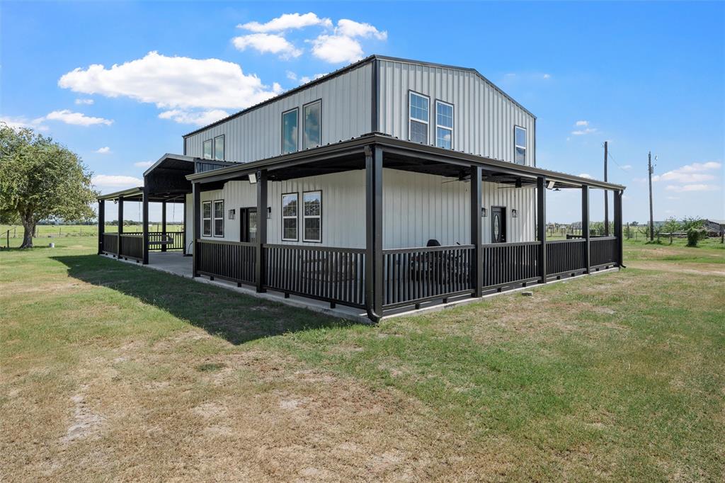 145 129a Marlin, TX 76661 - Photo 5 of 38 a view of a house with a yard and deck