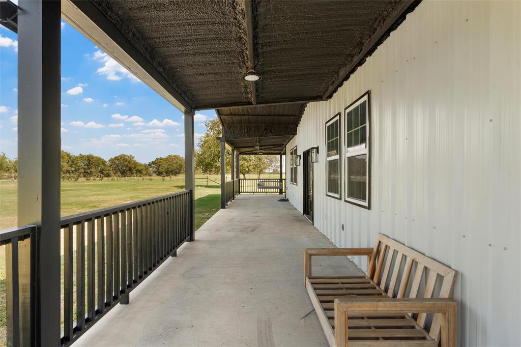 145 129a Marlin, TX 76661 - Photo 6 of 38 a view of a porch with furniture and garden