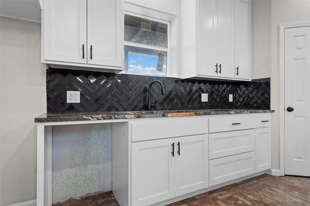145 129a Marlin, TX 76661 - Photo 7 of 38 a kitchen with a sink and cabinets