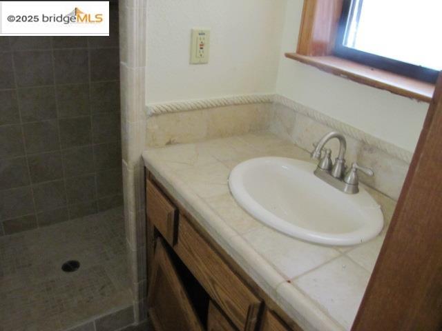 20280 Little Valley Road Groveland, CA 95321 - Photo 16 of 32 a bathroom with a sink and a mirror