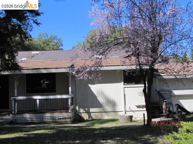 20280 Little Valley Road Groveland, CA 95321 - Photo 16 of 24 a view of house with a yard
